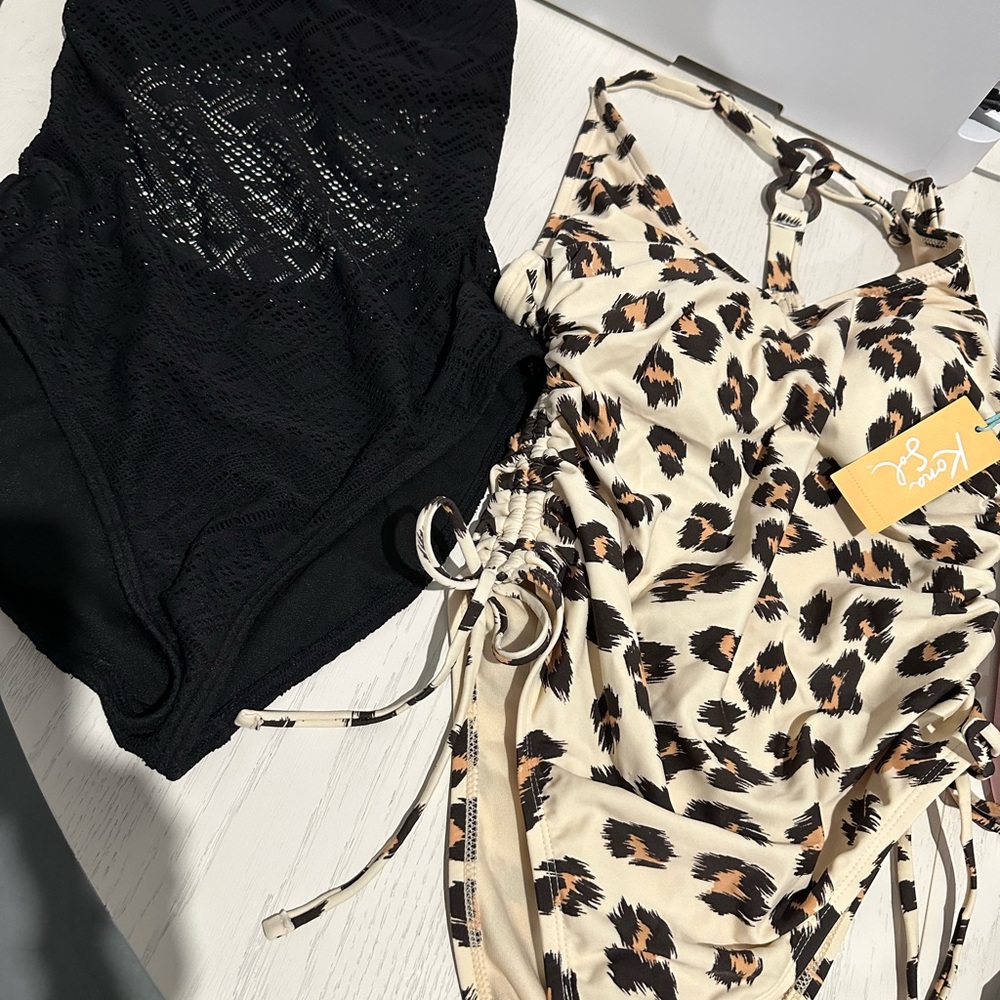 Elegant Black Lace Bodysuit and leapord one piece.